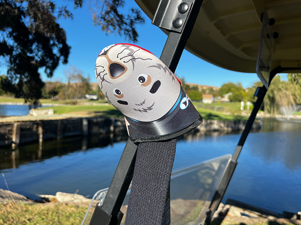 Photo of Gopher Product showcasing the magnetic feature attached to the metal frame of a golf cart