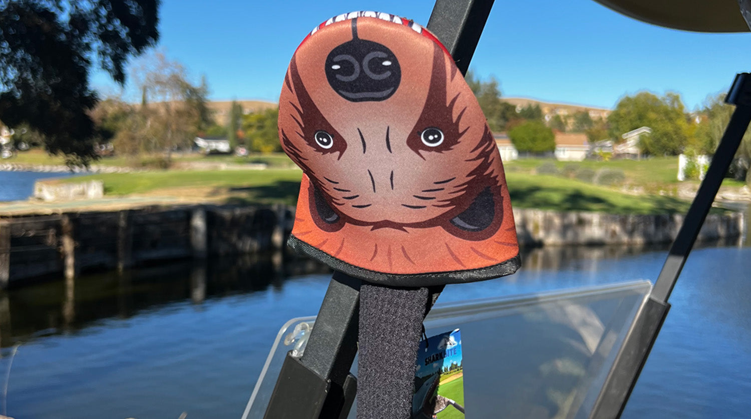 Photo of Bear Product showcasing the magnetic feature of the product adhered to a golf cart